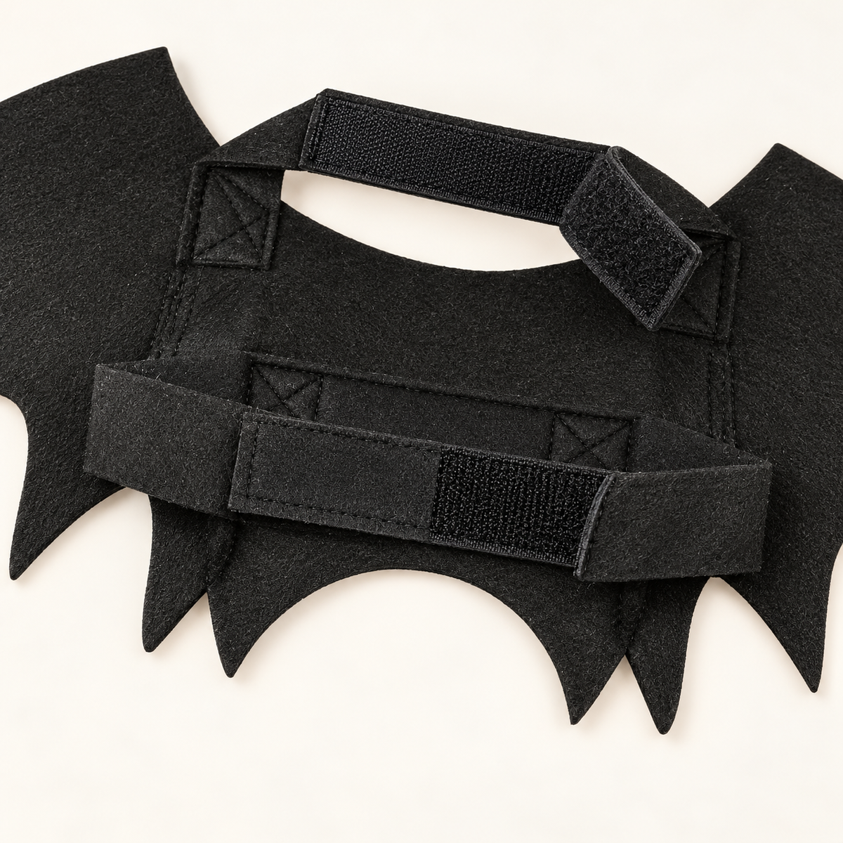 Close-up of bat wing costume hook-and-loop straps