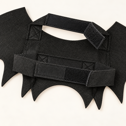 Close-up of bat wing costume hook-and-loop straps